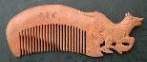 carved zodiac comb