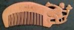carved zodiac comb