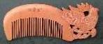 carved zodiac comb