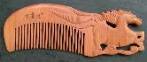 carved zodiac comb