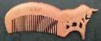 carved zodiac comb