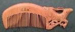 carved zodiac comb