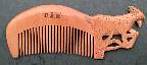 carved zodiac comb
