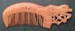 carved zodiac comb