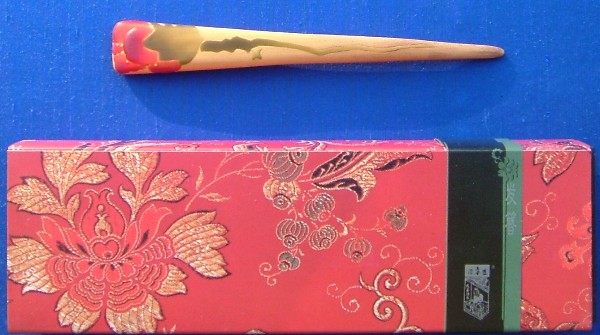 wooden hair sticks with drawn flower